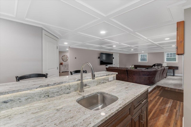 74 Settlers Ct, Bedford, NH 03110 - kitchen featuring light stone countertops, dark wood finished floors, recessed lighting, coffered ceiling, and open floor plan