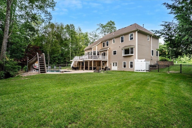 74 Settlers Ct, Bedford, NH 03110 - rear view of property featuring a wooden deck, a patio, and view of scattered trees