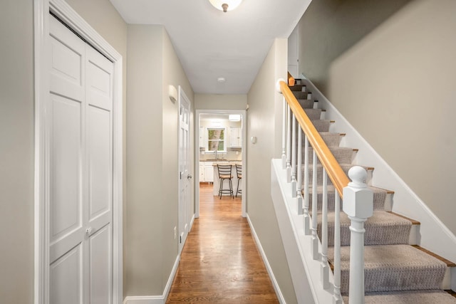 26 Harvard Ln, Bedford, NH 03110 - staircase with wood finished floors and baseboards