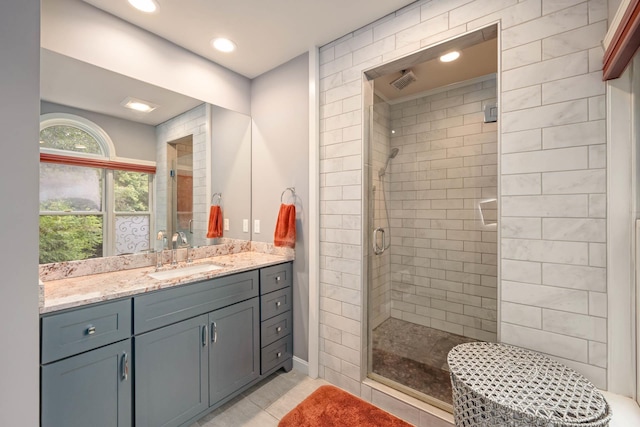 26 Harvard Ln, Bedford, NH 03110 - bathroom with a shower stall, vanity, recessed lighting, and tile patterned flooring