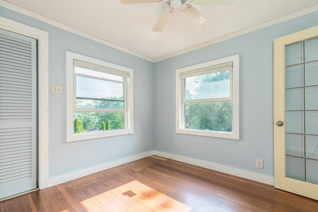 11 Bridge St, Kittery, ME 03904 - unfurnished bedroom featuring ornamental molding, hardwood / wood-style flooring, and ceiling fan