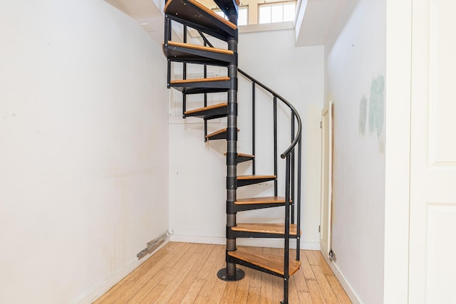 11 Bridge St, Kittery, ME 03904 - stairway featuring wood-type flooring and baseboards