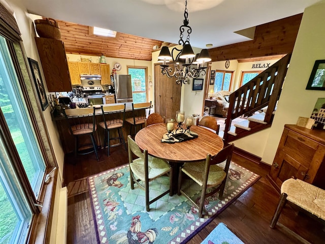 851 German Flats Rd, Fayston, VT 05673 - dining area featuring dark wood finished floors and a chandelier