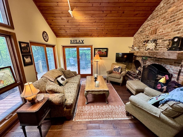851 German Flats Rd, Fayston, VT 05673 - living area featuring wooden ceiling, a fireplace, wood finished floors, and high vaulted ceiling