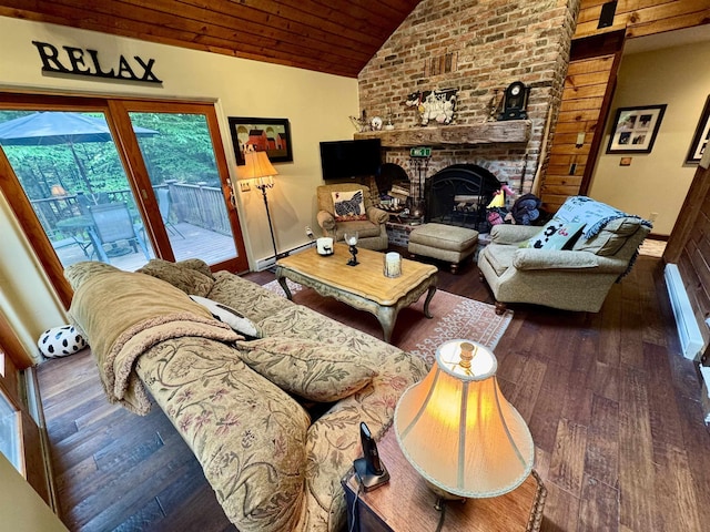 851 German Flats Rd, Fayston, VT 05673 - living room with lofted ceiling, wood ceiling, wood finished floors, and a fireplace