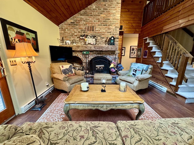 851 German Flats Rd, Fayston, VT 05673 - living area with wooden ceiling, hardwood / wood-style floors, stairway, high vaulted ceiling, and a fireplace