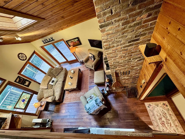 851 German Flats Rd, Fayston, VT 05673 - living area with hardwood / wood-style flooring, wooden ceiling, a skylight, and lofted ceiling