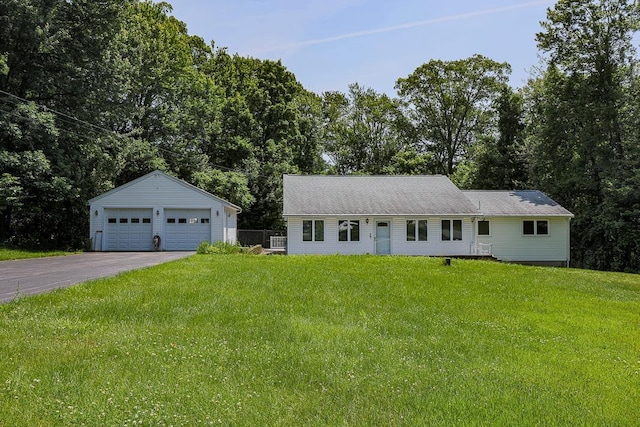 4 Appaloosa Ave, Pelham, NH 03076 - view of front facade featuring a garage, a front lawn, and view of wooded area