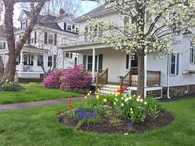 175 Middle Rd, Portsmouth, NH 03801 - rear view of house with covered porch, a lawn, and a balcony