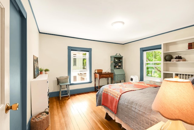 175 Middle Rd, Portsmouth, NH 03801 - bedroom featuring hardwood / wood-style floors and ornamental molding