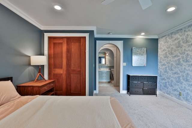 465 Pennell Rd, Chester, VT 05143 - bedroom featuring crown molding, carpet flooring, arched walkways, recessed lighting, and wallpapered walls