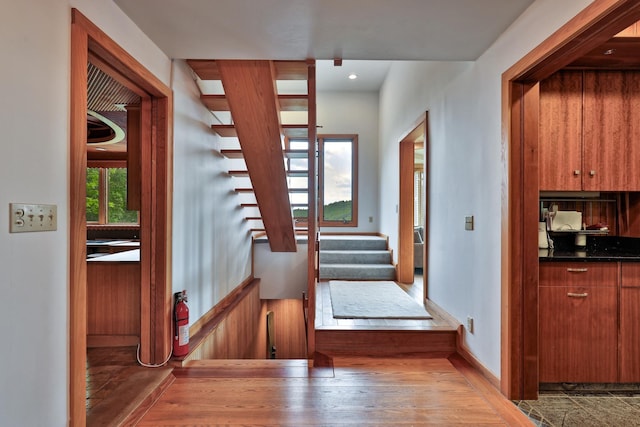 465 Pennell Rd, Chester, VT 05143 - staircase with wood finished floors and baseboards
