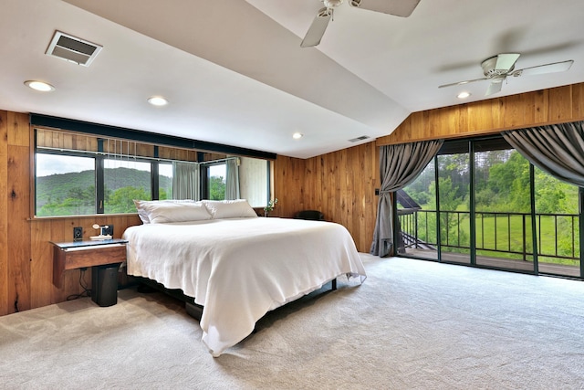 465 Pennell Rd, Chester, VT 05143 - bedroom with carpet, wooden walls, access to exterior, multiple windows, and recessed lighting