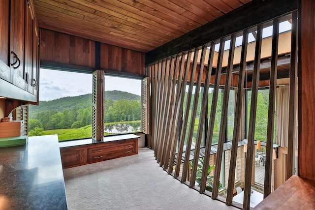 465 Pennell Rd, Chester, VT 05143 - unfurnished sunroom featuring a view of trees