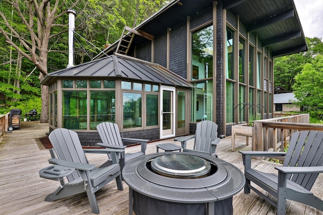 465 Pennell Rd, Chester, VT 05143 - wooden terrace featuring a fire pit
