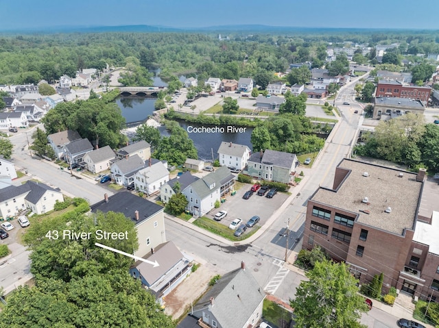 43AB River St, Rochester, NH 03867 - aerial perspective of suburban area featuring a large body of water
