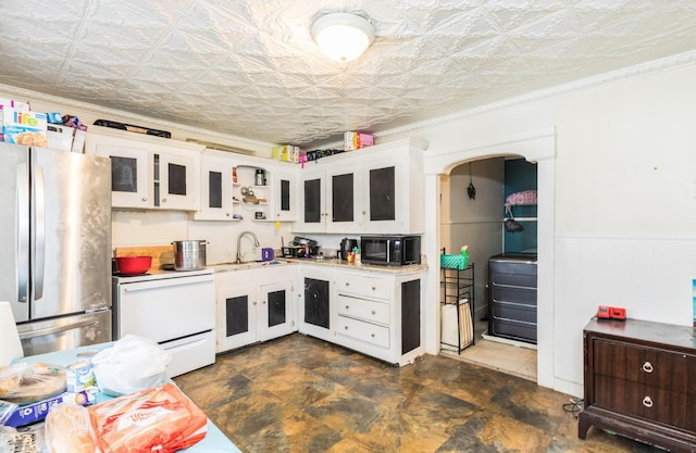43AB River St, Rochester, NH 03867 - kitchen with freestanding refrigerator, white electric range oven, black microwave, an ornate ceiling, and light countertops