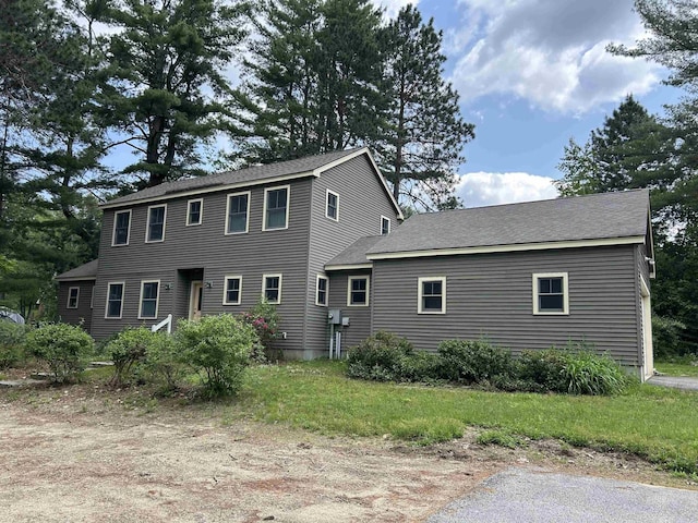 11 Morrison Ave, Meredith, NH 03253 - colonial-style house with roof with shingles
