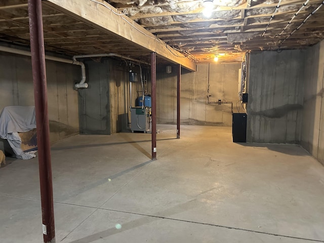 11 Morrison Ave, Meredith, NH 03253 - unfinished basement featuring a heating unit