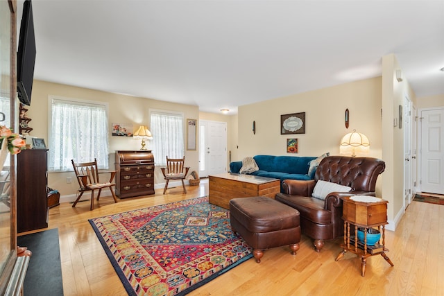 42 Leddy Dr, Epping, NH 03042 - living area with light wood-type flooring and baseboards