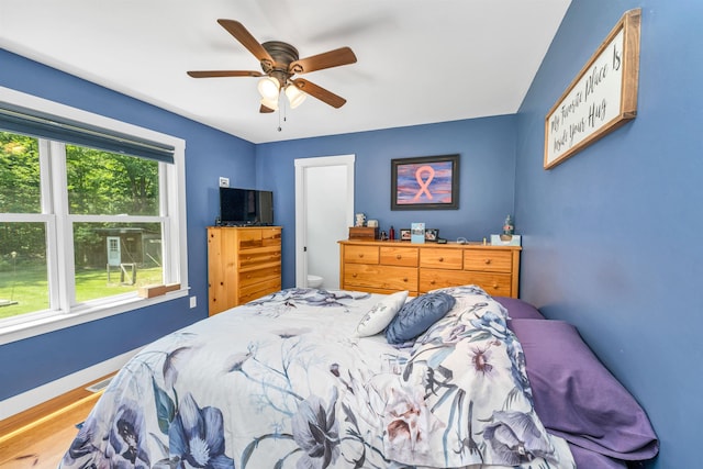 30 Dillon Dr E E, Unit East, Strafford, NH 03884 - bedroom featuring wood finished floors and a ceiling fan