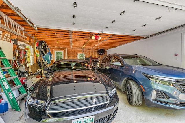 30 Dillon Dr E E, Unit East, Strafford, NH 03884 - garage featuring a garage door opener
