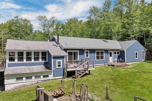 30 Dillon Dr E E, Unit East, Strafford, NH 03884 - view of front of property with a deck, a front lawn, and roof with shingles
