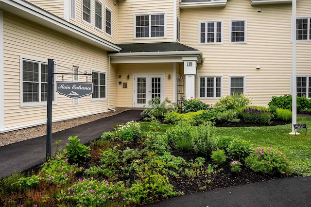 118 Secretariat Way Unit 115, Rochester, NH 03867 - view of exterior entry featuring french doors