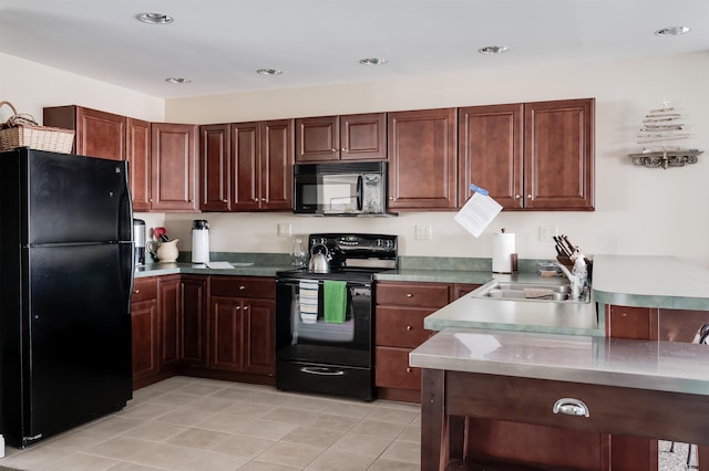 118 Secretariat Way Unit 115, Rochester, NH 03867 - kitchen with black appliances, light tile patterned flooring, recessed lighting, and light countertops