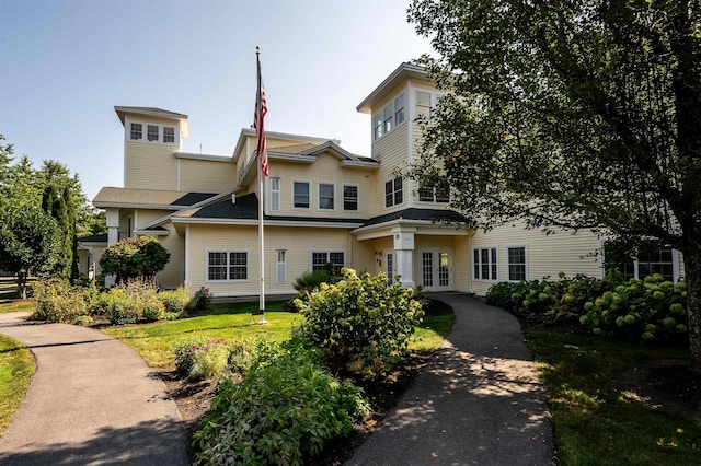 118 Secretariat Way Unit 115, Rochester, NH 03867 - view of front of house with french doors and a front lawn