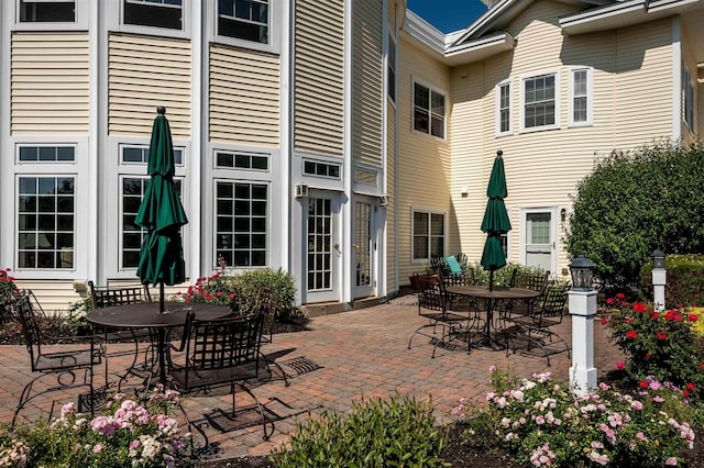 118 Secretariat Way Unit 115, Rochester, NH 03867 - view of patio / terrace with outdoor dining space