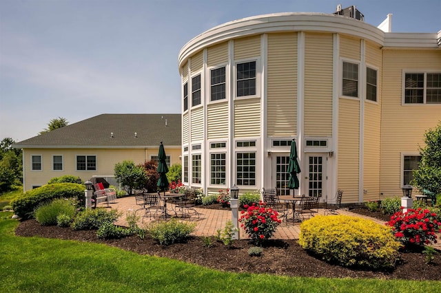 118 Secretariat Way Unit 115, Rochester, NH 03867 - back of property with a patio area