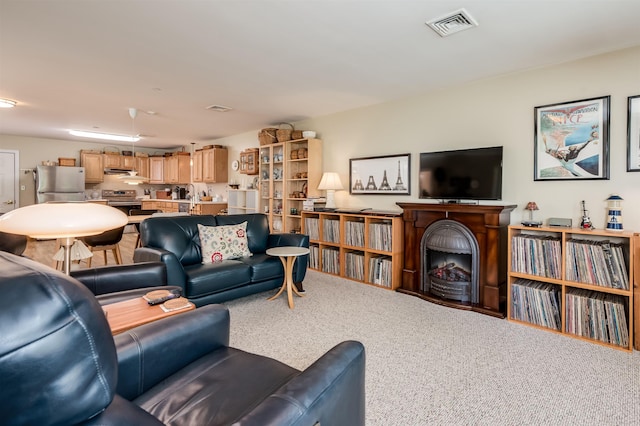 118 Secretariat Way Unit 115, Rochester, NH 03867 - living area with carpet flooring