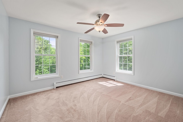 202 Cherry Valley Rd, Alton, NH 03810 - spare room with baseboard heating, plenty of natural light, carpet, and a ceiling fan