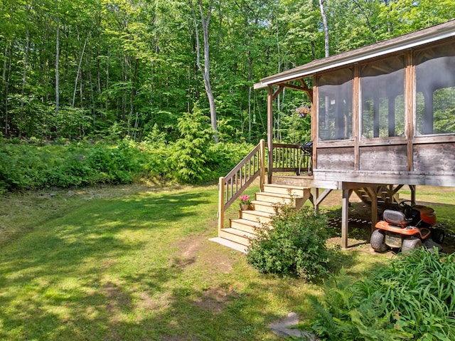 202 Cherry Valley Rd, Alton, NH 03810 - view of green lawn with a sunroom, stairs, and a view of trees