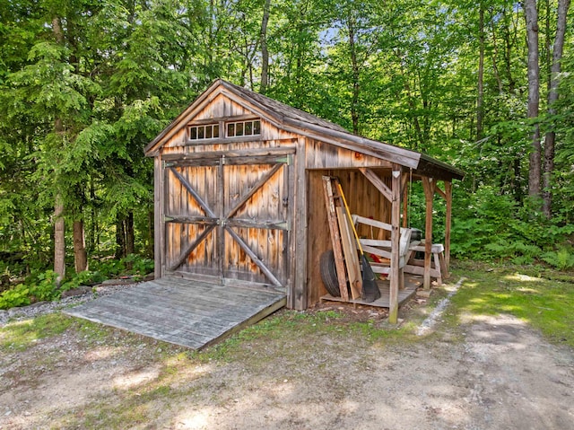 202 Cherry Valley Rd, Alton, NH 03810 - view of shed featuring a forest view