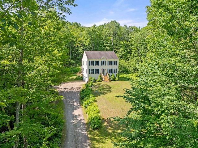 202 Cherry Valley Rd, Alton, NH 03810 - view of front of home with driveway, a wooded view, and a front yard