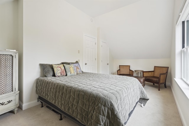 88 Stonehouse Rd, New London, NH 03257 - carpeted bedroom with lofted ceiling and baseboards