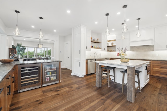 88 Stonehouse Rd, New London, NH 03257 - kitchen with beverage cooler, stainless steel dishwasher, open shelves, backsplash, and recessed lighting