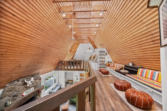 812 Airport Rd, Fayston, VT 05660 - living area with wood ceiling, wood finished floors, rail lighting, and vaulted ceiling