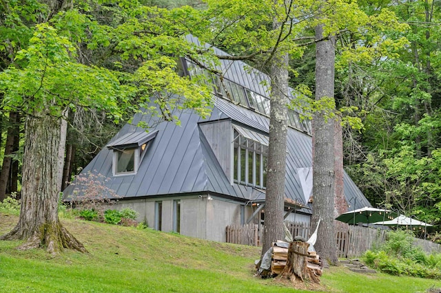 812 Airport Rd, Fayston, VT 05660 - rear view of house with a standing seam roof and a metal roof