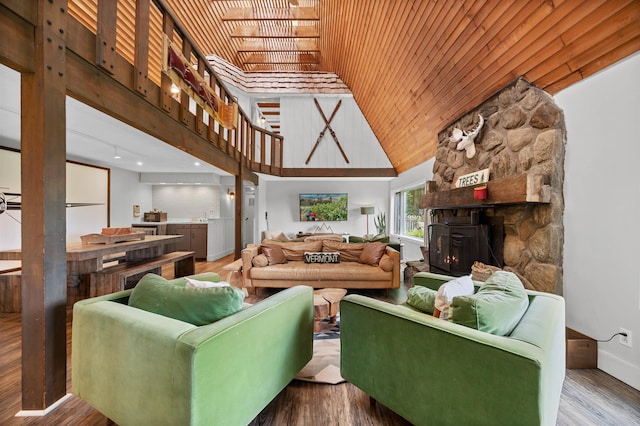 812 Airport Rd, Fayston, VT 05660 - living area with a fireplace, wooden ceiling, wood finished floors, and high vaulted ceiling