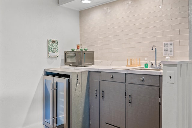 812 Airport Rd, Fayston, VT 05660 - bar with wine cooler and tasteful backsplash