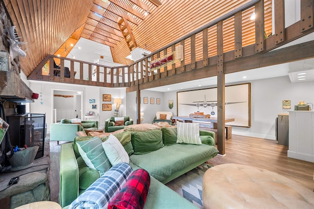 812 Airport Rd, Fayston, VT 05660 - living room featuring a towering ceiling, wood finished floors, and recessed lighting
