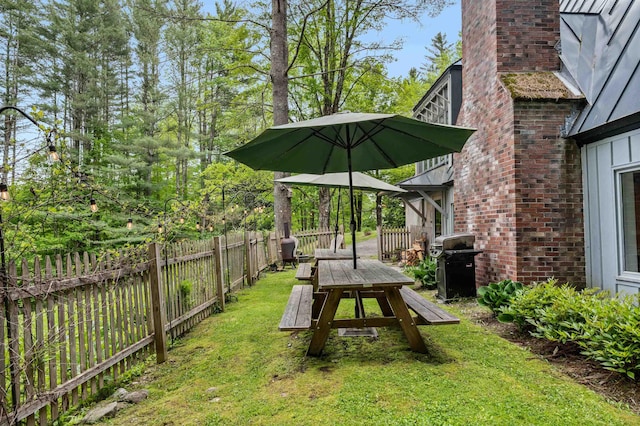 812 Airport Rd, Fayston, VT 05660 - fenced backyard with outdoor dining area
