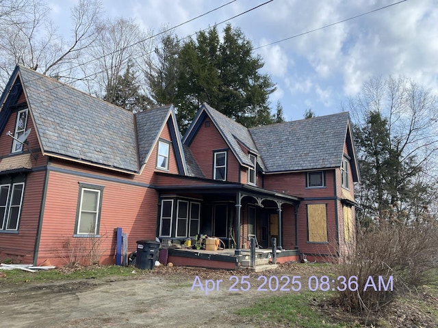 23 S Main St, Randolph, VT 05060 - view of front facade featuring a high end roof and covered porch