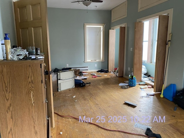 23 S Main St, Randolph, VT 05060 - unfurnished bedroom with wood finished floors and baseboard heating