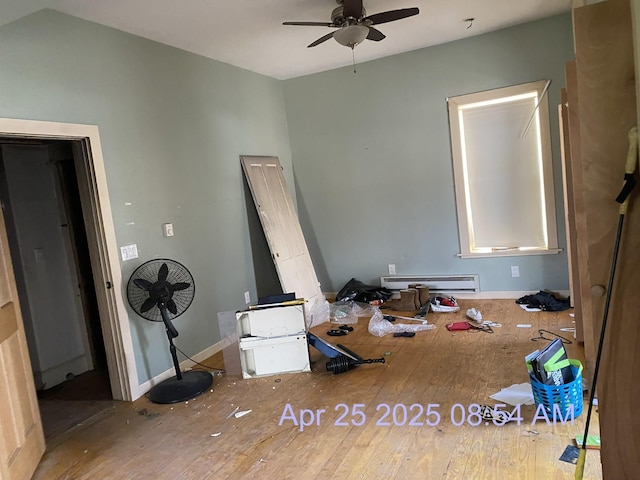 23 S Main St, Randolph, VT 05060 - unfurnished bedroom with a baseboard radiator and hardwood / wood-style floors