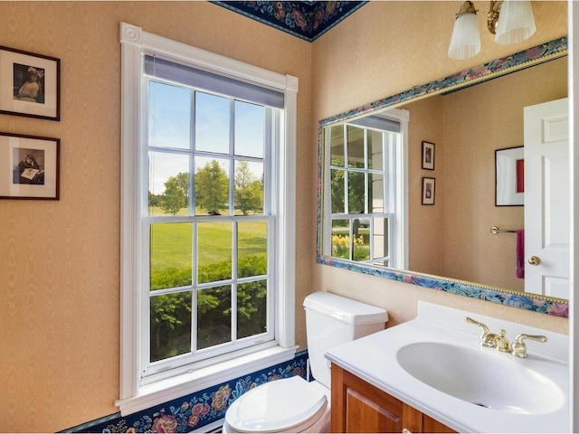 1411 Spear St, South Burlington, VT 05403 - half bathroom featuring wallpapered walls and vanity