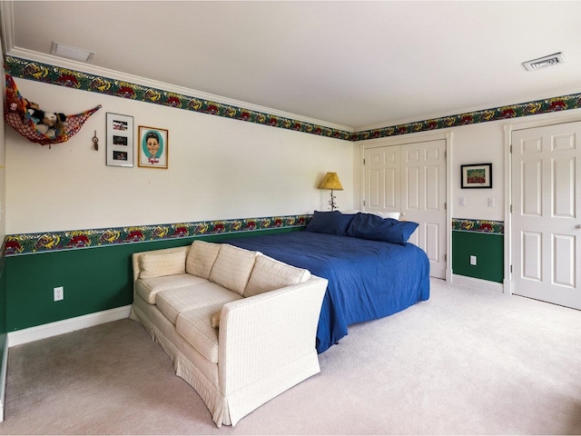 1411 Spear St, South Burlington, VT 05403 - bedroom with light colored carpet, a closet, and crown molding